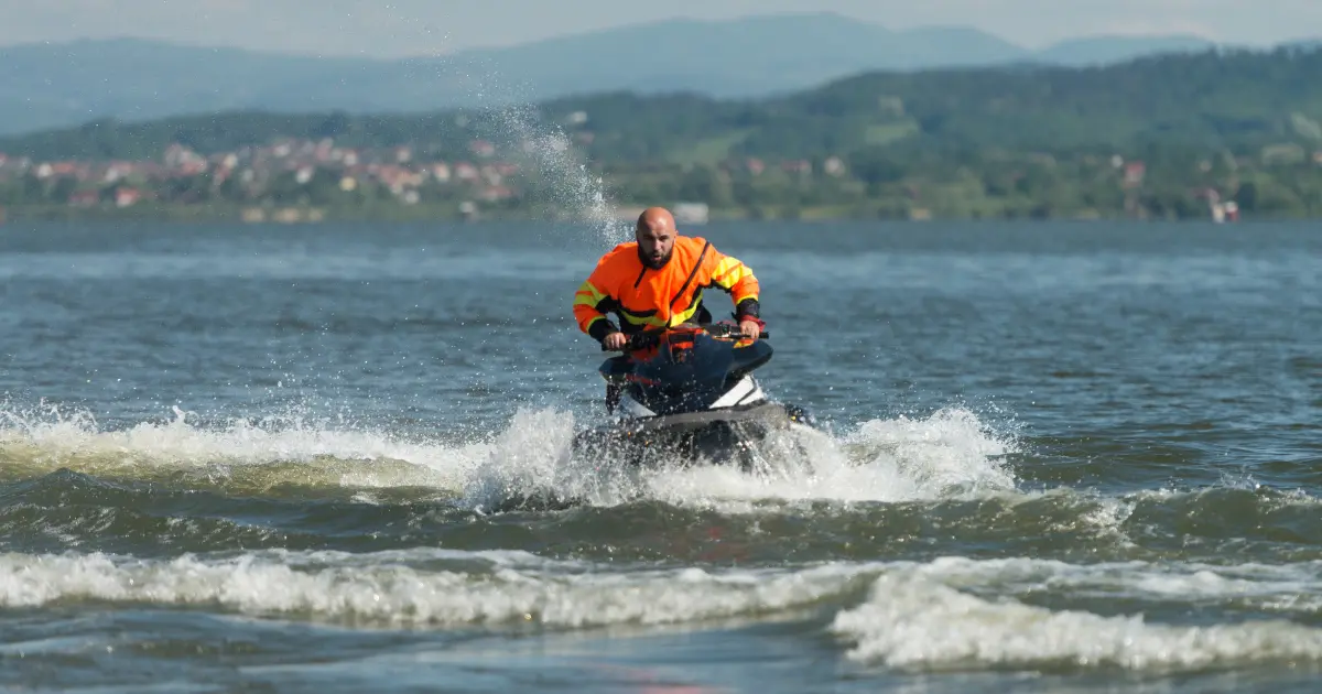 skippers riding jet ski